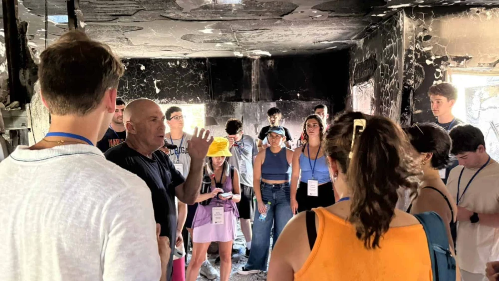 U.S. students visit Be'eri, Israel on Aug. 8, 2025. Courtesy of Hasbara Fellowships and IsraelAmbassadors.com.