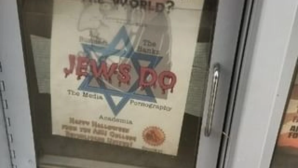 An anti-Semitic flier with the words “Jews Do” in red lettering that has drops falling from them to resemble blood was superimposed over a Star of David and a shadowy image of a hooked-nosed man with ears shaped like a devil. Source: StopAntisemitism.org.