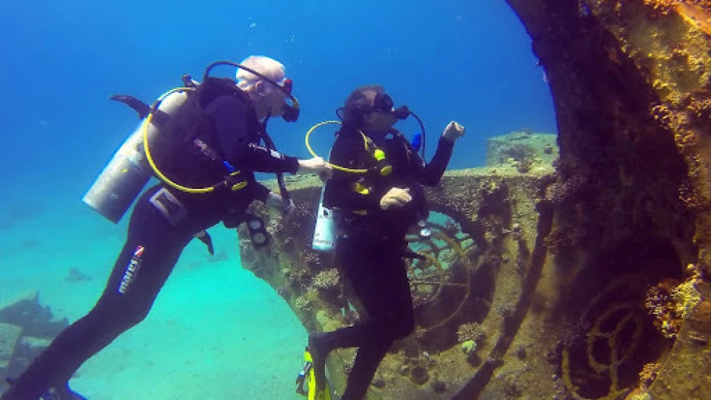 Paul Driessen (left) scuba diving in Eilat. Photo courtesy of Paul Driessen.