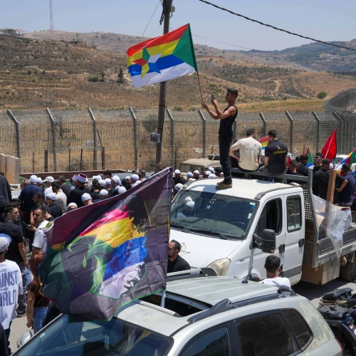 Druze residents protest near the Israeli-Syrian border fence in solidarity with their community in Syria, in Majdal Shams, July 16, 2025. Photo by Ayal Margolin/Flash90.
