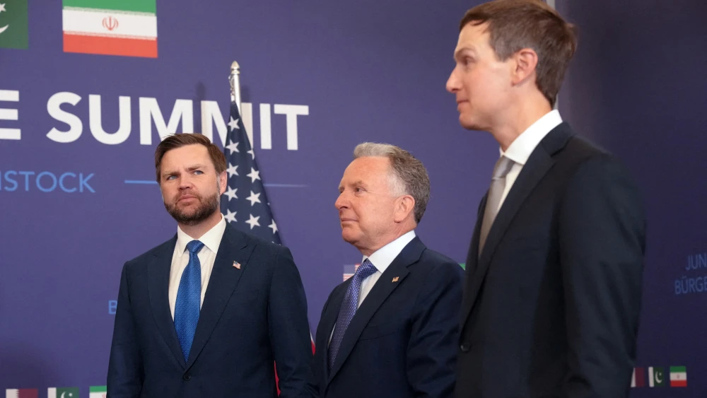 U.S. Vice President JD Vance stands alongside U.S. special envoys Steve Witkoff (center) and Jared Kushner at the Burgenstock luxury hotel complex overlooking Lake Lucerne, Switzerland, on June 21, 2026. Photo by Nathan Howard/POOL/AFP via Getty Images.