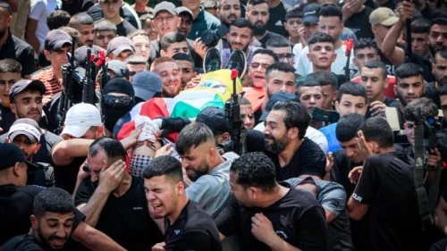 Palestinian gunmen and mourners take part in the funeral of Palestinians kiiled in an Israeli drone attack, in the Balata refugee camp, on Aug. 15, 2024. Photo by Nasser Ishtayeh/Flash90.