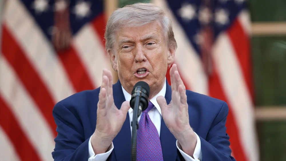 U.S. President Donald Trump delivers remarks at a 'Rose Garden Club' dinner for National Police Week in the Rose Garden at the White House on May 11, 2026, in Washington, D.C. Credit: Kevin Dietsch/Getty Images.