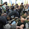 Police begin to clear protesters blocking the road in Modi'in. Photo by Yossi Zeliger/TPS.