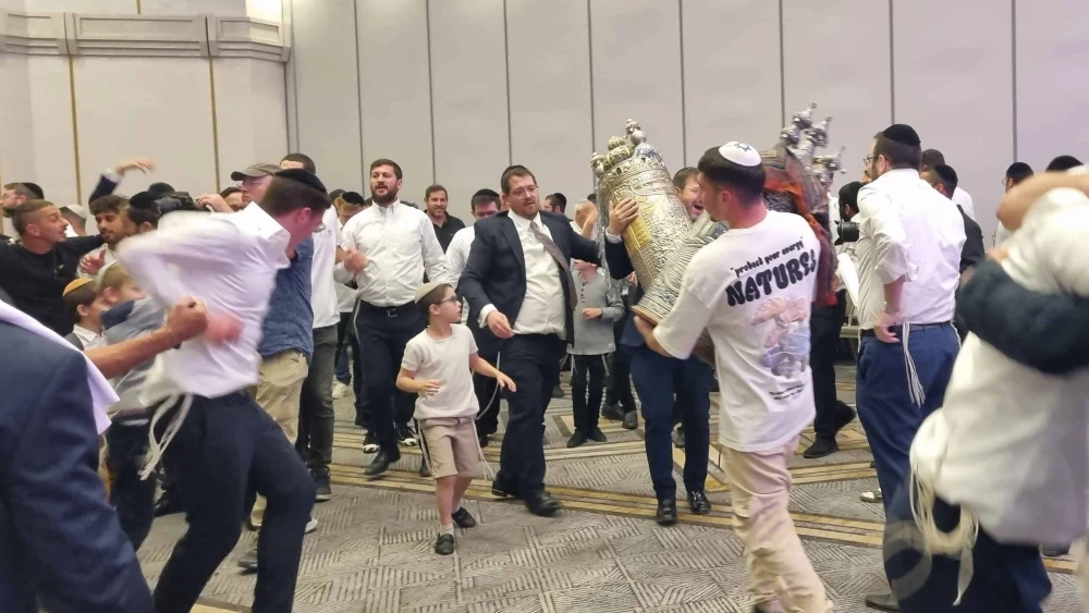 Oct. 7 survivors and hostages' families take part in a Simchat Torah celebration at the Ramada Hotel in Jerusalem, Oct. 23, 2024. Credit: Courtesy.