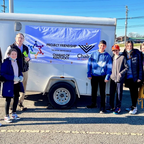Ms. E, Orly, Mr. Lassner, Aaron, Jeremy, Shirel and Chloe arrive Project Friendship Warehouse for first day of chesed. Credit: Courtesy.
