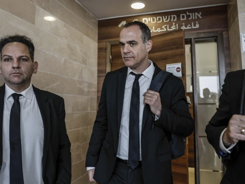 Lawyers gather outside the court hearing for Bezalel Zini, who is suspected of smuggling cigarettes into the Gaza Strip, at the Ashkelon Magistrate’s Court, Feb. 3, 2026. Photo by Tsafrir Abayov/Flash90.
