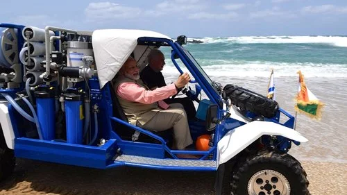 Indian Prime Minister Narendra Modi and Israeli Prime Minister Benjamin Netanyahu take a jeep ride on the Olga Beach in northern Israel Thursday. Credit: Kobi Gideon/GPO.