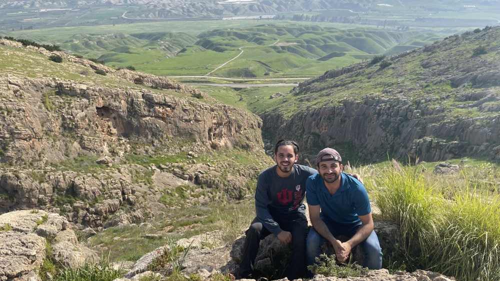 Sam Parker (left) hiking in the Jordan Valley with a friend. Credit: Courtesy.