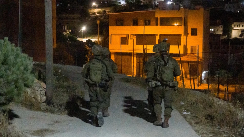 Israeli soldiers operate during a counterterrorism raid in the Beit Ummar area of the Etzion Regional Brigade, July 30, 2026. Credit: IDF.