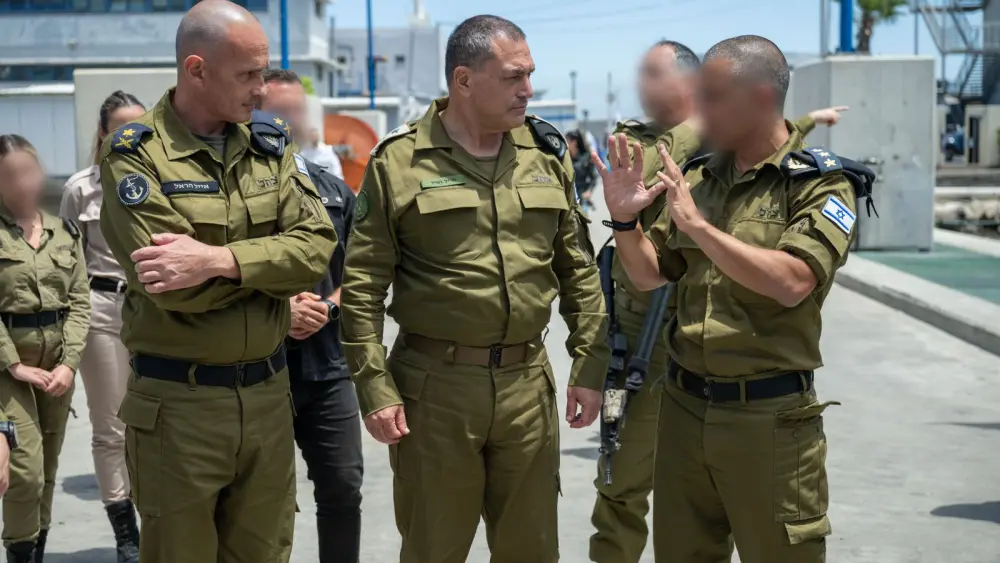 Israeli officers speak during a tour of the Israeli Navy’s Haifa base during a visit by the IDF chief of staff, in Haifa, Israel, June 3, 2026, in a handout photo. Credit: IDF.
