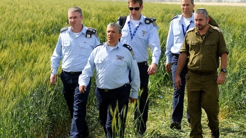 Click photo to download. Caption: Israel Air Force Commander Major General Amir Eshel (front) investigating the accident in which two Air Force pilots were killed in an Israeli military helicopter crash in the Revadim area south of Gedera on Tuesday, March 12. Credit: Yossi Zeliger/Flash90