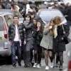 Distressed teenagers walk away from the Ozar Hatorah Jewish school in Toulouse, France, on March 19, 2012, where a man opened fire and killed a 30-year-old teacher and three young children, age 3, 6 and 10. Credit: EPA/MAXPPP/XAVIER DE FENOYL.