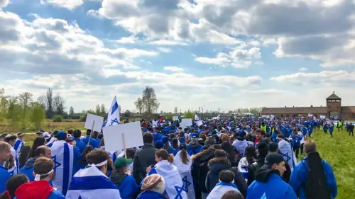 Thousands of young people from around the world walk from Auschwitz to Birkenau, the sites of former Nazi death camps, as part of the 2017 “March of the Living” program in Poland. Credit: Drew Jacobson via Facebook.