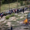 Children and their parents gather around a bonfire ahead of the Jewish holiday of Lag Ba'omer, in the northern Israeli city of Tzfat, May 8, 2023. Photo by Gershon Elinson/Flash90