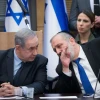 Israeli Prime Minister Benjamin Netanyahu speaks with Shas Party chairman Aryeh Deri during a meeting with the heads of the right-wing parties on March 4, 2020. Photo by Yonatan Sindel/Flash90.