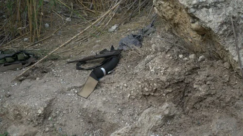A photo of what appears to be an AK-47 assault rifle and explosives found with seven Islamic State terrorists who entered Israel. Credit: IDF Spokesperson Unit.