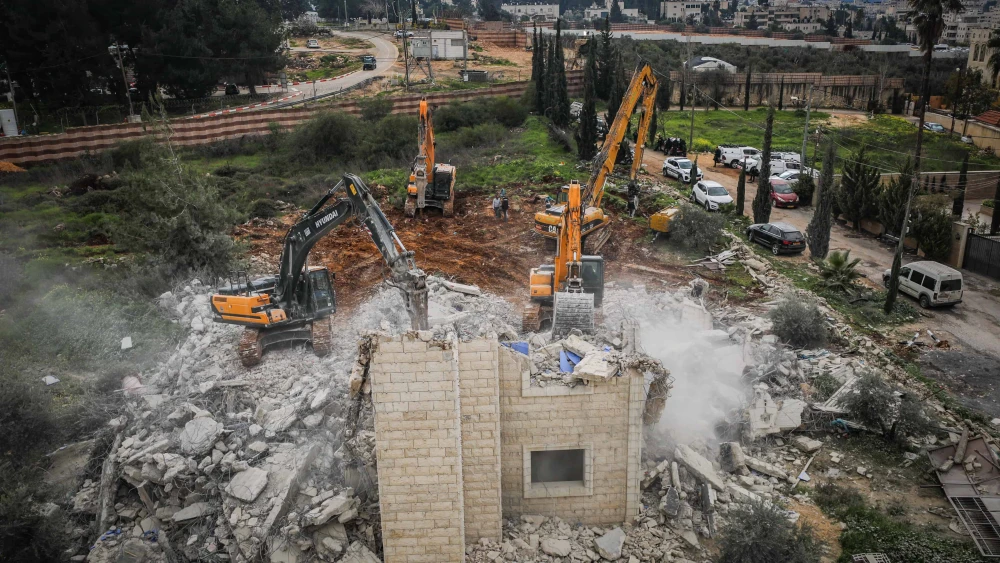 Security forces destroy a building built without a permit in the Jerusalem neighborhood of Beit Hanina, Feb. 20, 2024. Photo by Jamal Awad/Flash90.