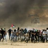 Palestinian protesters during clashes with Israeli forces along the border with Gaza on May 11, 2018. Credit: Abed Rahim Khatib/Flash90.