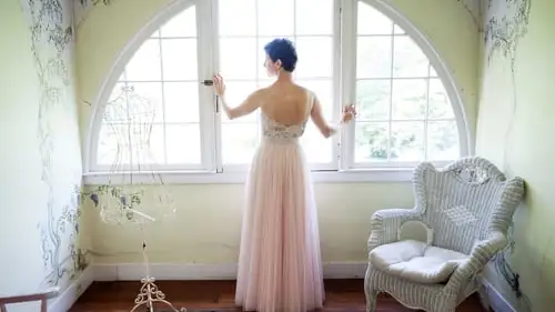 Melinda Michel of Baltimore is pictured in the dress she wore to her second wedding. Credit: Richard and Tara Photography.