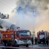 Israeli firefighters work to extinguish a fire at a factory in Sderot, caused from rocket fired from the Gaza Strip, Nov. 12, 2019. Photo by Noam Revkin Fenton/Flash90.