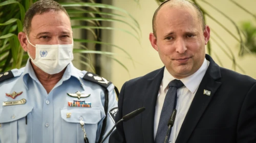 Israeli Prime Minister Naftali Bennett and Police Chief Yaakov Shabtai during an inauguration ceremony marking the opening of a new police station in Kiryat Ata, Aug. 11, 2021. Photo by Roni Ofer/Flash90.