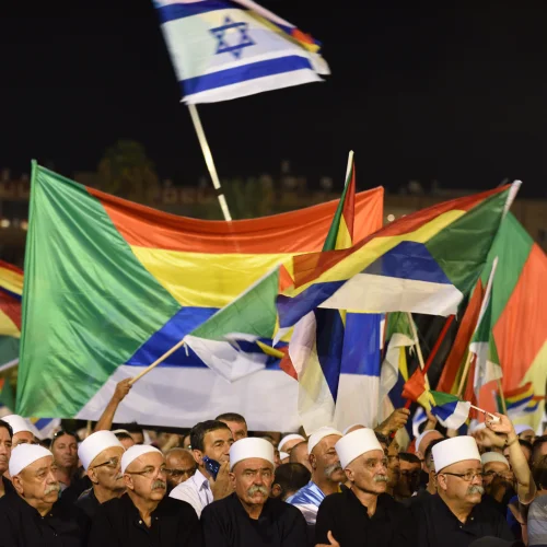 Israeli Druze attend a Druze-led rally to protest against the 'Jewish Nation-State law' in Rabin Square, Tel Aviv on Aug. 04, 2018. Tens of thousands of Israeli Druze and their supporters gathered in Tel Aviv on Saturday night to protest against the 'Jewish Nation-State' law. Photo by Gili Yaari /FLASH90