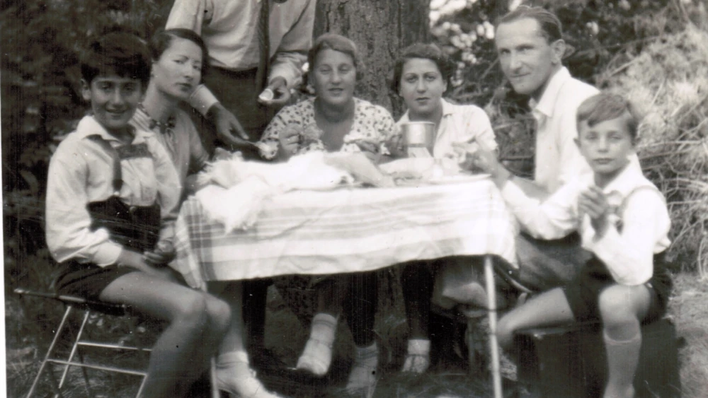 Happy days in Poland: Richard (far left) with his parents (third and fifth from left) and others at a picnic in 1933. Credit: Courtesy.
