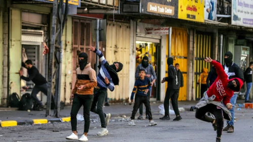 Israeli soldiers clash with Palestinian youth following a military operation in the West Bank city of Jenin on Jan. 26, 2023. Photo by Wisam Hashlamoun/Flash90.