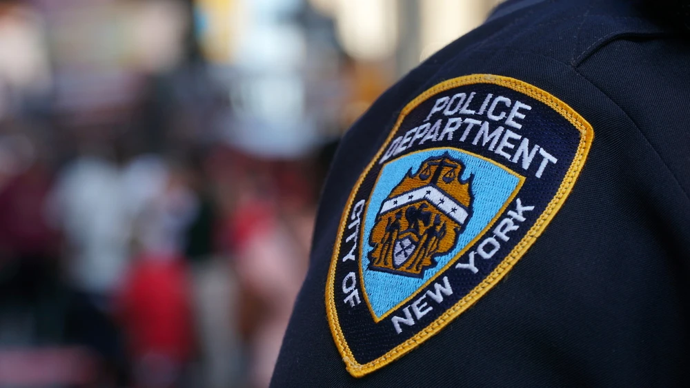 New York City Police Department officer patch. Credit: BrandonKleinPhoto/Shutterstock.