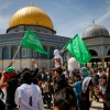 Palestinians fly Hamas flags after Ramadan prayers at the Al-Aqsa mosque on the Temple Mount in Jerusalem, April 22, 2022. Photo by Jamal Awad/Flash90.