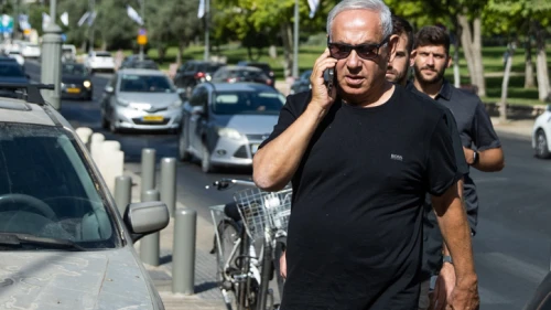 Israeli opposition leader and former prime minister Benjamin Netanyahu takes a morning walk in central Jerusalem, June 1, 2022. Photo by Yonatan Sindel/Flash90.