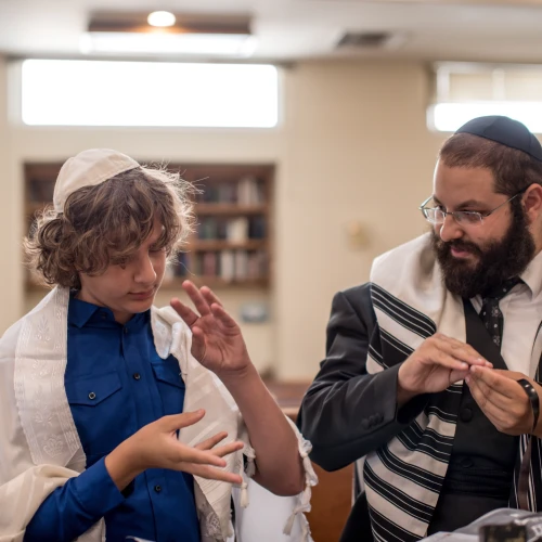 Rabbi Yehoshua Soudakoff, executive director of the Jewish Deaf Foundation (JDF) and director of Chabad of the Deaf Community in Israel, working with a student. Courtesy.