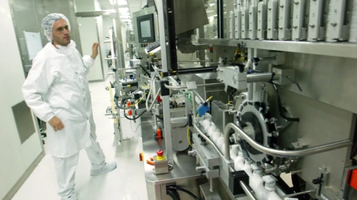 An Engineer watches over a production line at the Teva Pharmaceutical Industries plant in Jerusalem, Israel, on July 5, 2007. Photo by Olivier Fitoussi/Flash90.