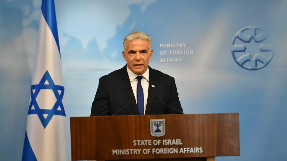 Israeli Foreign Minister Yair Lapid briefs reporters regarding ongoing Arab violence at the Temple Mount during the month of Ramadan, at the Foreign Ministry on April 24, 2022. Photo by: Shlomi Amsalem/GPO.