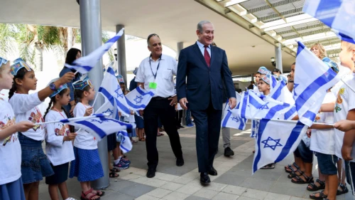 Israeli Prime Minister Benjamin Netanyahu visits Israeli children on the first day of the school year in Yad Binyamin on Sept. 2, 2018. Photo by Avi Ohayon/GPO.