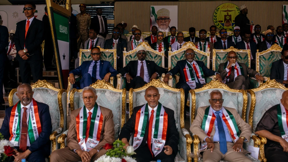 Chairman of the Waddani Party Xirsi Hersi Ali Hassan, chairman of the KAAH Party Mohamoud Hashi Abdi and chairman of the House of Representatives of Somaliland Yasin Haji Mohamoud Hiir “Faratoon” attend Independence Day celebrations near the presidential palace in Hargeisa on May 18, 2026. Photo by Kang-Chun Cheng/AFP/Getty Images.