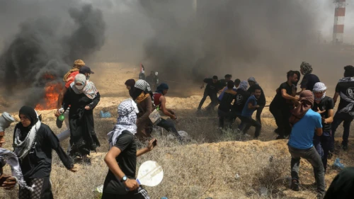 Palestinians burn tires during protests along the Gaza-Israel border fence commemorating the “Naksa” on June 8, 2018. Photo by Abed Rahim Khatib/Flash90.