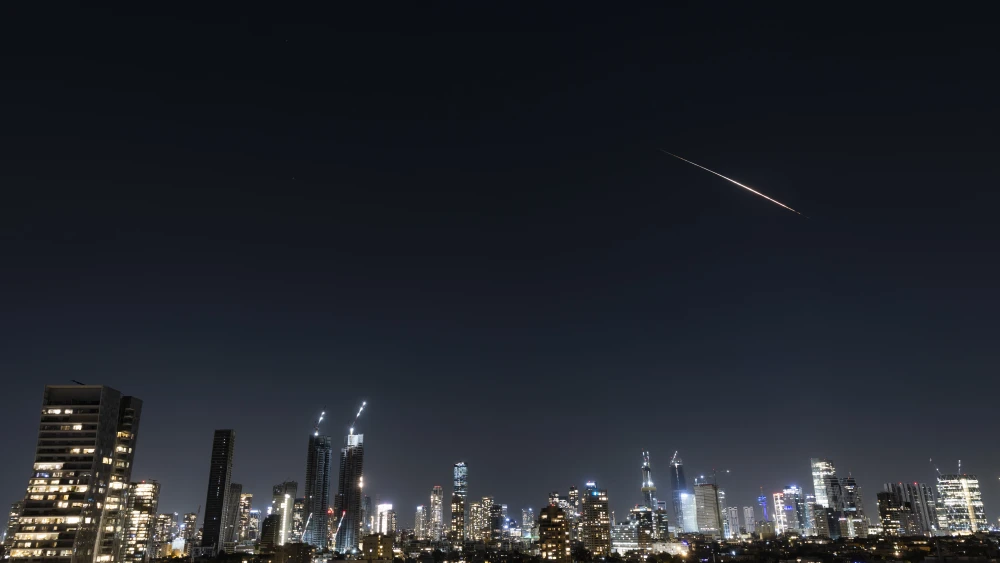 Aerial-defense batteries fire interceptor missiles at incoming Iranian ballistic missiles, as seen over Jerusalem on March 11, 2026. Photo by Chaim Goldberg/Flash90.