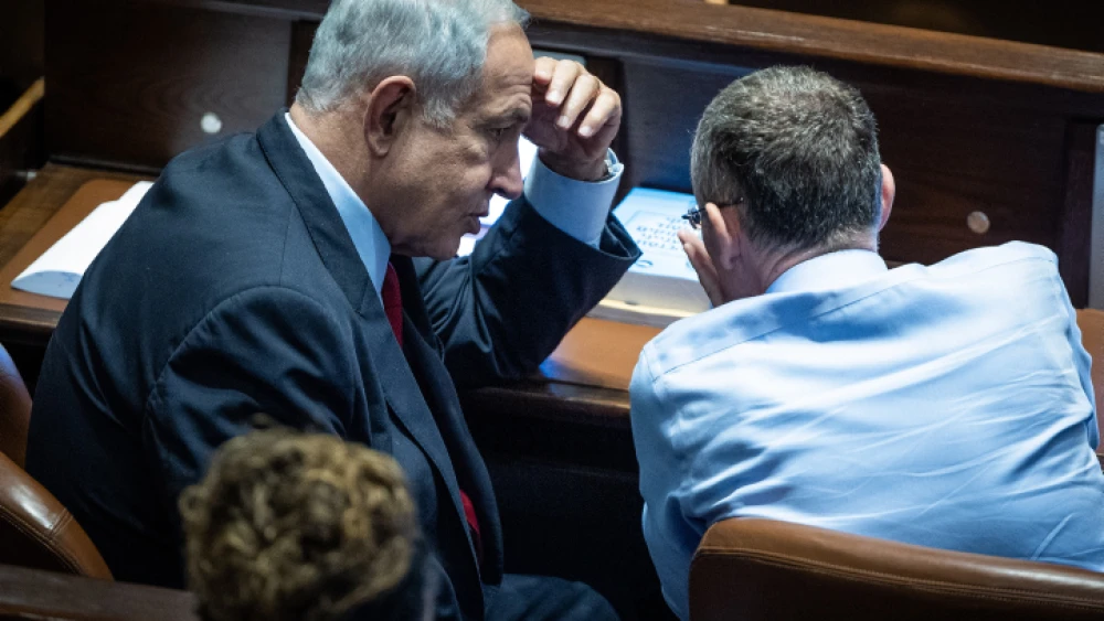 Likud Party chairman MK Benjamin Netanyahu with Likud MK Yariv Levin in the Knesset assembly hall on Nov. 21, 2022. Photo by Yonatan Sindel/Flash90.