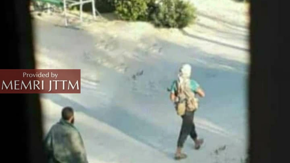 ISIS gunmen walking in Rabi’a village after an attempted terror attack on July 21, 2020. Credit: MEMRI.
