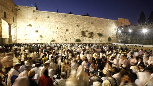 Worshippers gather for the ritual of Tisha B'Av at the Wall Western in the Old City of Jerusalem early morning Aug. 9, 2011. Photo by Miriam Alster/Flash90.