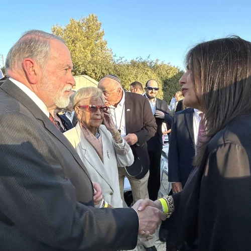US Ambassador Mike Huckabee greets Jewish National Fund-USA Israel Director Tali Tzour Avner at the 9/11 memorial ceremony in Jerusalem, September 11, 2025. Photo by Judy Lash Balint.