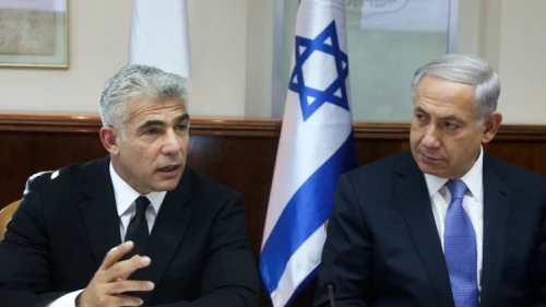 Israeli Prime Minister Benjamin Netanyahu Finance Minister Yair Lapid at a cabinet meeting on October 7, 2014. Photo by Marc Israel Sellem/POOL/Flash90.