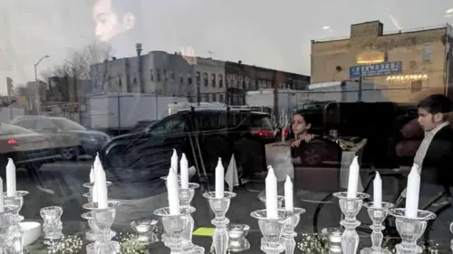 One week after an attack on the Chabad House in the Bushwick neighborhood of Brooklyn, 150 community members, local residents and visitors unite to respond to hatred with light. Credit: Chabad.org/News.