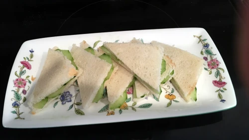 Take out your best trays for winter tea and fill them up with dainty delights, like these Cucumber Sandwiches. Credit: Ethel G. Hofman.