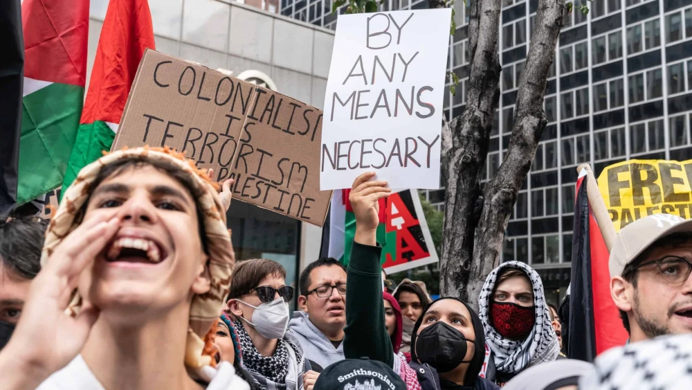 Hamas backers rally in Times Square in New York City in support of the terror group's Oct. 7 invasion and attack, Oct. 9, 2023. Photo by Lev Radin/Shutterstock.