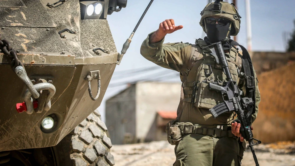 Israeli soldiers operate with their armored vehicles in the Samaria city of Jenin, March 4, 2025. Photo by Nasser Ishtayeh/Flash90.