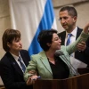 Knesset member Hanin Zoabi is removed by Knesset security during her speech at a plenum session before a vote on a bill requiring left-wing foundations and organizations to reveal their sources of funding, on Feb. 8, 2016. Photo by Hadas Parush/Flash90.