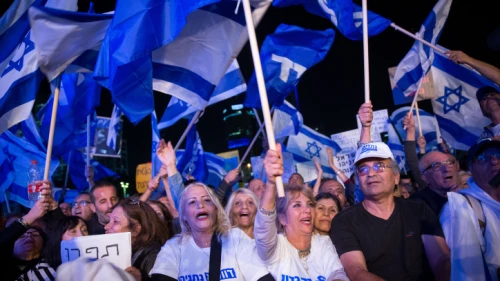 Supporters of Israeli Prime Minister Benjamin Netanyahu during a rally in Tel Aviv on Nov. 26, 2019. Photo by Miriam Alster/Flash90.